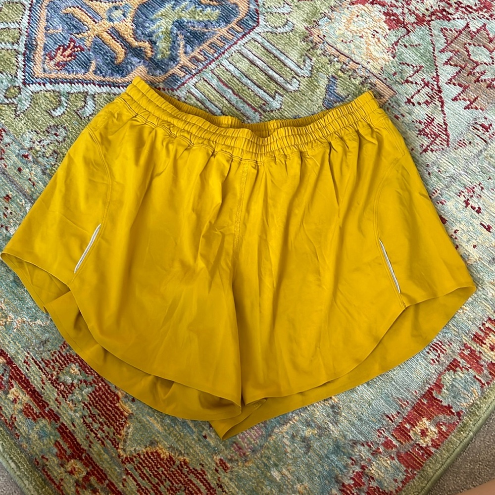 Yellow Lululemon running shorts. Size 12